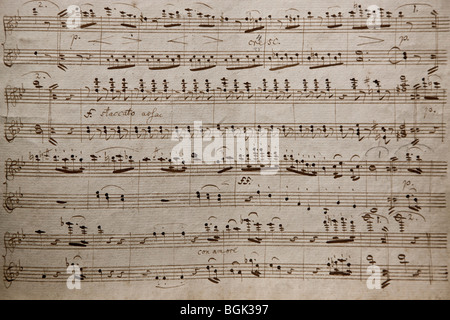 old sheet of music with handwritten notes, mf, mezzo-forte Stock