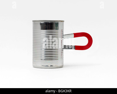 A Horseshoe Magnet attached to a can Stock Photo