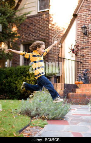 boy jumping in air Stock Photo