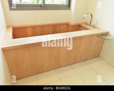 Wooden bathtub in modern bathroom Stock Photo