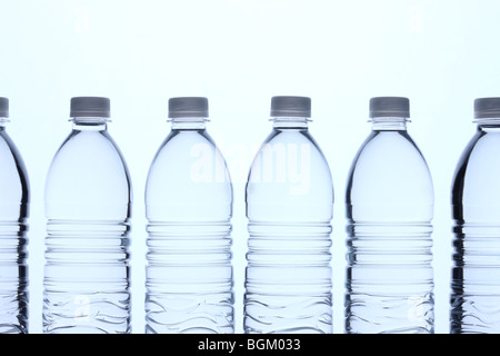 Water bottles in a row Stock Photo - Alamy