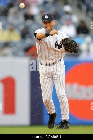 Derek Jeter #2 of the New York Yankees throws to first against the Oakland Athletics on April 22, 2009 at Yankee Stadium Stock Photo