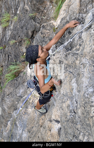 Rock Climbers Scaling cliffs East Java, Indonesia. Sport climbing growing in popularity worldwide, and Indonesia offers a variety of sport climbs. Stock Photo