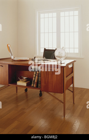 Old-fashioned office with modern laptop Stock Photo