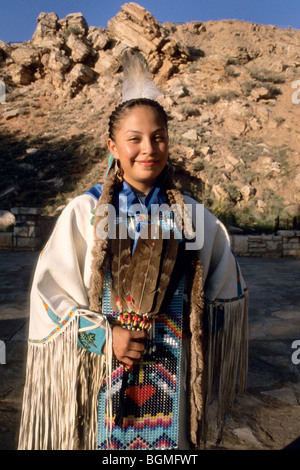 Arapaho teenage girl dressed in traditional regalia decorated with ...