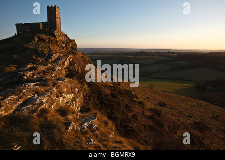 Brent Tor Church lit by the last rays of winter sunshine, Dartmoor, Devon. Stock Photo