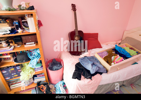 A female teenager's messy bedroom. Stock Photo