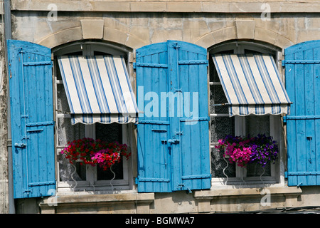 Blue window shutters and awnings, Arles, Bouches-du-Rhône, France Stock Photo