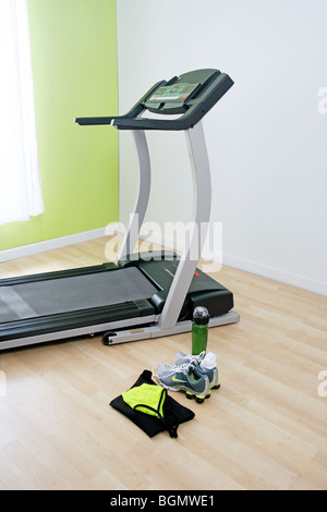 treadmill and work out clothes are ready to go Stock Photo
