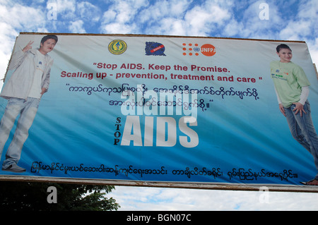 Burmese road signs and banners in Tachileik, MYANMAR Stock Photo