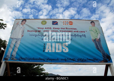 Burmese road signs and banners in Tachileik, MYANMAR Stock Photo