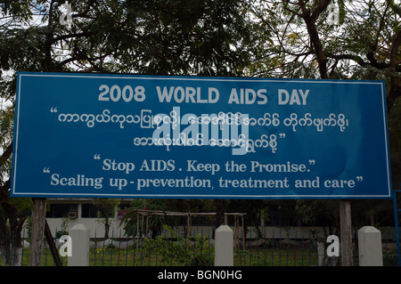 Burmese road signs and banners in Tachileik, MYANMAR Stock Photo