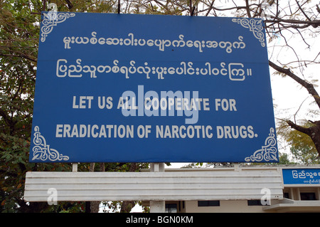 Burmese road signs and banners in Tachileik, MYANMAR Stock Photo