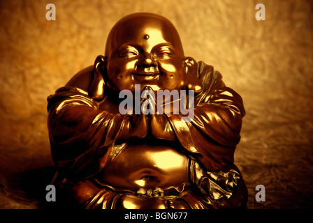 fat Buddha or Budai praying Stock Photo