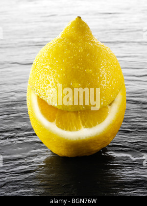 Wole lemon with a smiley face Stock Photo