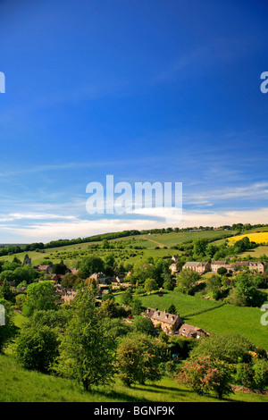 Landscape view Stone Built Cottages Naunton Village Gloucestershire Cotswolds England UK Stock Photo