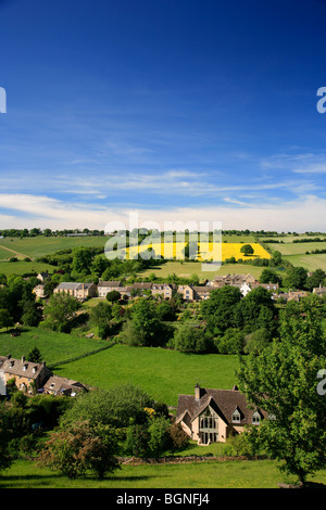 Landscape view Stone Built Cottages Naunton Village Gloucestershire Cotswolds England UK Stock Photo