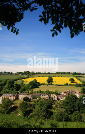 Landscape view Stone Built Cottages Naunton Village Gloucestershire Cotswolds England UK Stock Photo