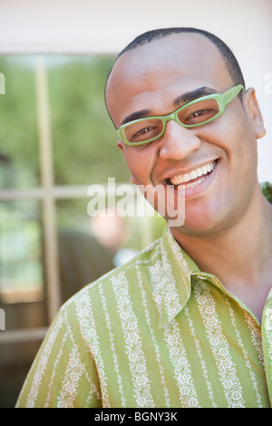 Portrait of a mid adult man wearing eyeglasses and smiling Stock Photo