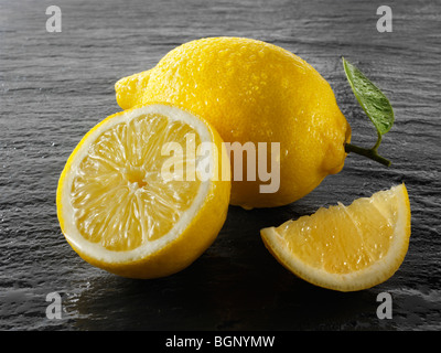 Fresh whole and cut lemons Stock Photo