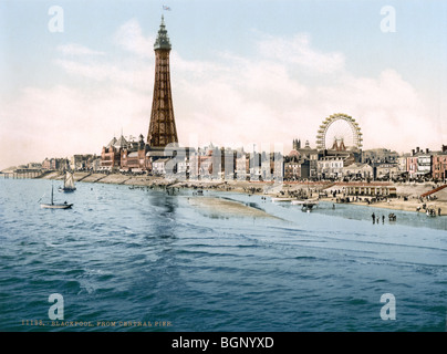 Historic photochrome colour print circa 1894 - 1900 of Blackpool Tower and seafront as seen from the Central Pier. Stock Photo