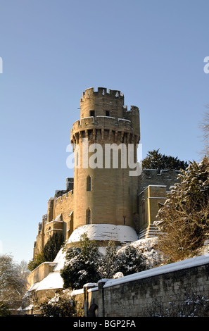 Warwick Castle in winter with snow, Warwickshire, England, UK Stock Photo