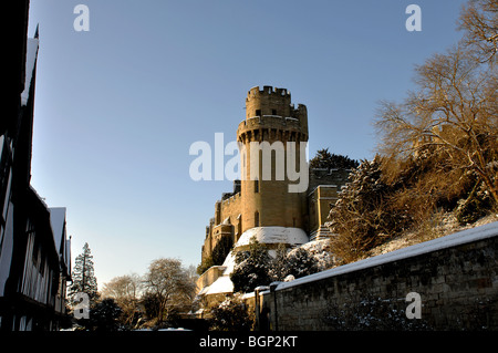 Warwick Castle in winter with snow, Warwickshire, England, UK Stock Photo