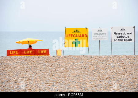 Beach safety on Brighton beach in East Sussex. A string of public safety signs welcome visitors. Picture Jim Holden. Stock Photo