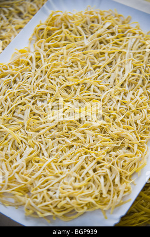 Handmade fettuccine pasta, close-up. Stock Photo