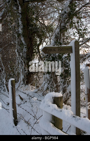 Footpath sign in Snow Stock Photo