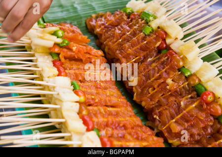 Kebabs, skewered meat for barbecue on street stall, Bangkok, Thailand Stock Photo