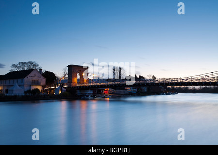 Marlow road bridge and The Complete Angler Restaurant on the River Thames at dusk, Buckinghamshire, Uk Stock Photo