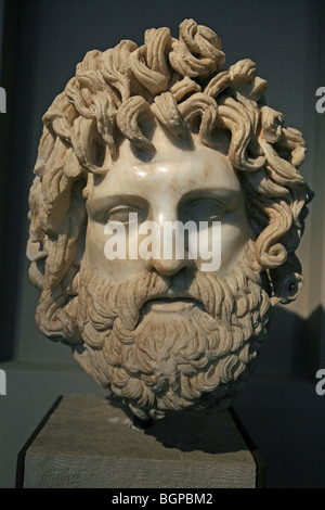 Head of a bearded god perhaps associated with cult statues of the family of Alexander the Great 175-200 AD Stock Photo