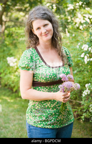 Portrait Of Mature Woman Gardening Stock Photo - Alamy
