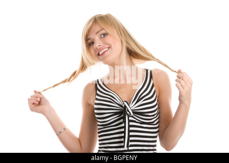 Portrait of young funny girl playing with her hair isolated on white background Stock Photo