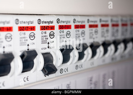 One fuse switched off in a fuse box ( breaker panel ) Stock Photo