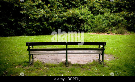 Bench with overgrown view in Sandbach park Cheshire UK Stock Photo