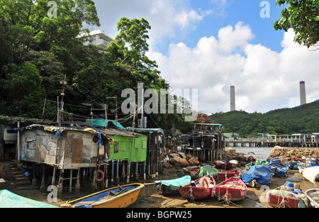 Informal stilt dwellings of Lamma fisherfolk, looking towards the jetty at Yung Shue Wan, Lamma Island, Hong Kong, China Stock Photo