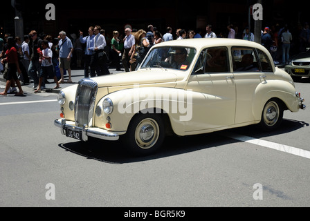 Big old white Daimler car in action, sporting the famous radiator grille. Stock Photo