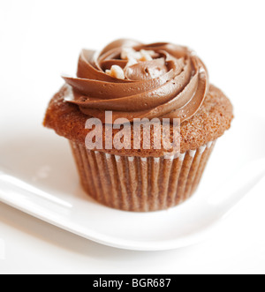 A Chocolate Cupcake with nuts Stock Photo