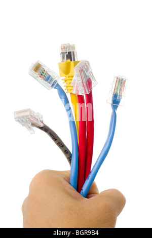 Hand holding a bunch of nework cables Stock Photo