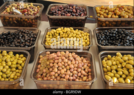 Different types of olives for sale at a French street market Stock Photo