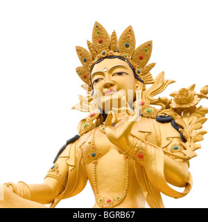 Golden Buddah statue of Green Tara a Tibetan buddhist God against white background. Stock Photo