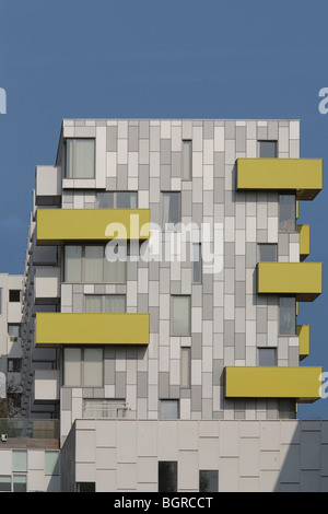 barking central learning centre and apartments, yellow and white balconies on grey and white elevation Stock Photo