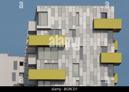 barking central learning centre and apartments, yellow and white balconies on grey and white elevation Stock Photo