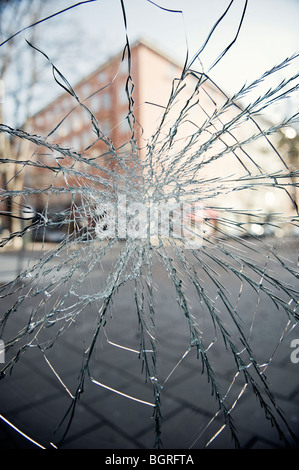 A smashed pane of glass, Sweden. Stock Photo