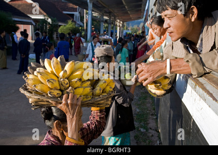 Woman selling bananas. Thazi train station. Myanmar Stock Photo