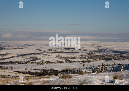 Winter landscape looking toward Kinder Scout from Lyme Handley  above Lyme Park and The Gristone Trail Cheshire England Stock Photo
