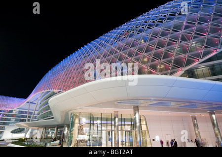 Evening shot of an illuminated Yas Viceroy Hotel at the Yas Island Formula One race track in, Abu Dhabi, UAE Stock Photo