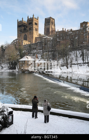 Tourists photographing Durham Cathedral winter 2009. Stock Photo